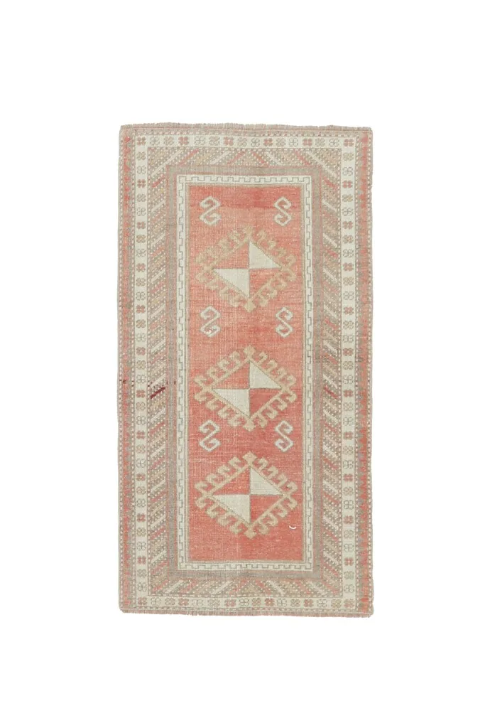 Full overhead view of the vintage Anatolian rug, emphasizing its rectangular shape and design
