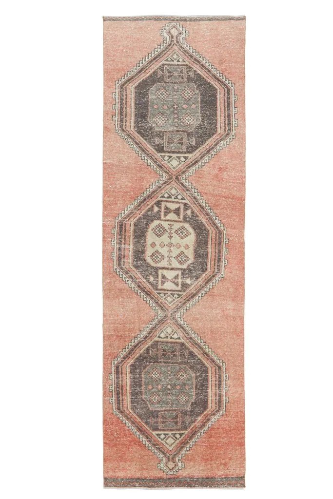 Full overhead view of the rust vintage Anatolian runner rug, showcasing its complete design