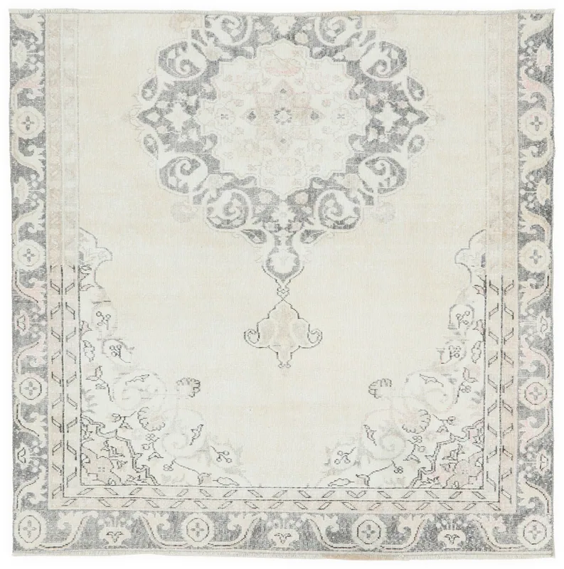 Full top view of the 6'6" x 6'11" ivory and gray vintage Anatolian wool rug on a white background.
