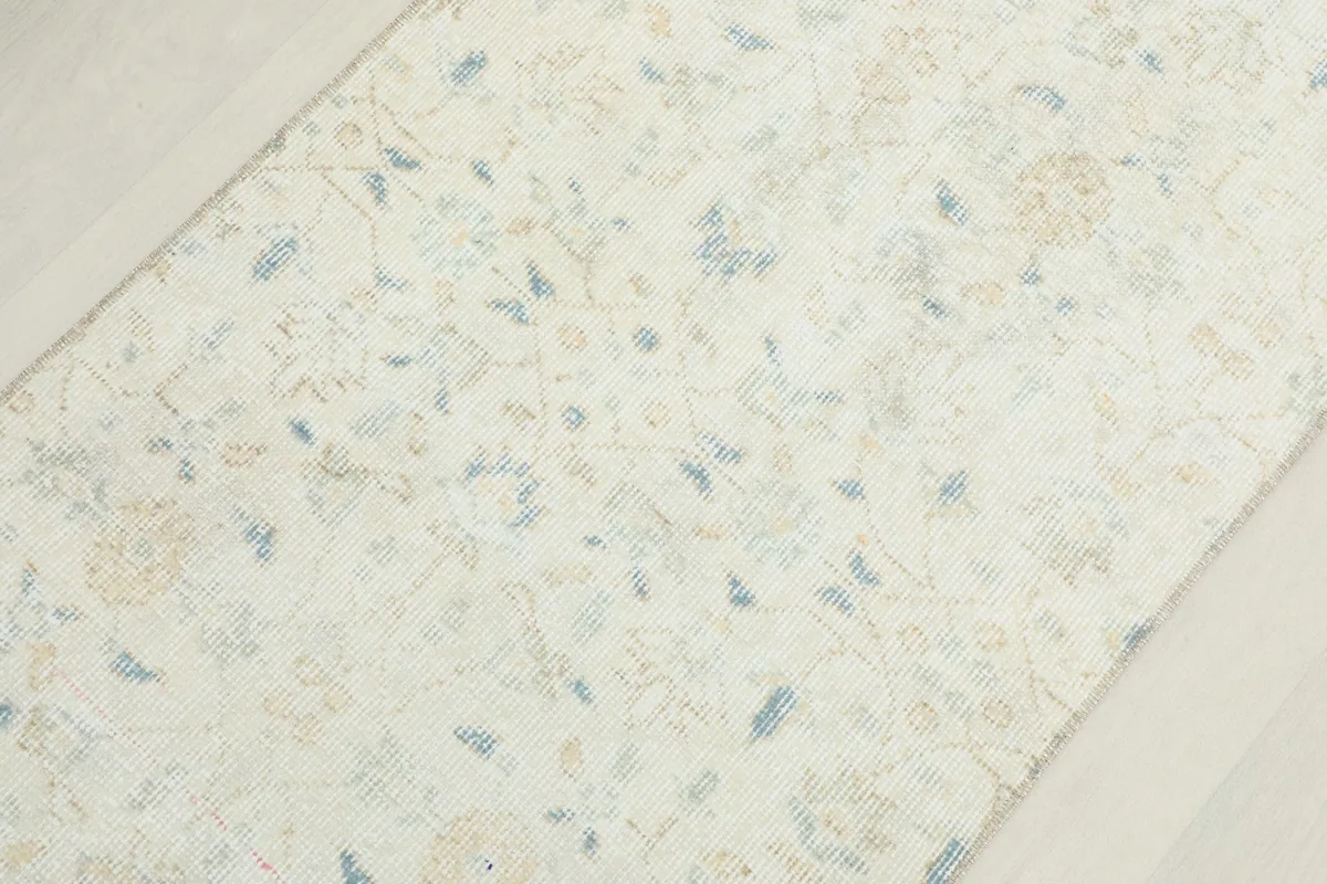 Another detailed view of the rug's central design, showcasing the overall pattern and color variations.