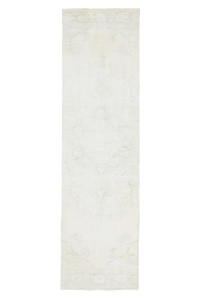Overhead view of the entire runner rug on a white background, displaying its full length and pattern