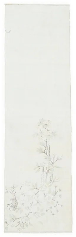 Full overhead view of the 2'5" x 8'5" vintage Anatolian runner rug with ivory field and botanical design