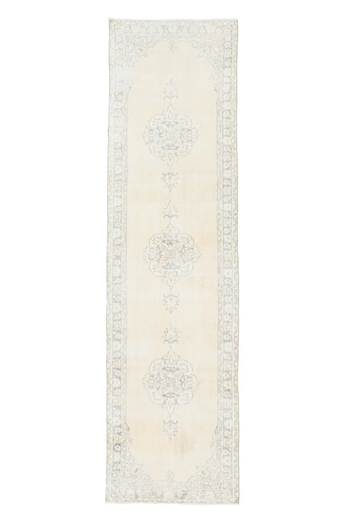 Overhead view of the entire vintage Anatolian runner rug, highlighting its full pattern.