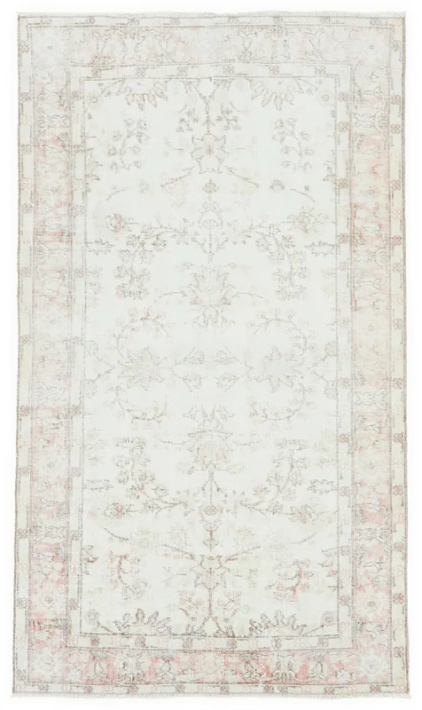 Full top view of the 3'8" x 6'7" ivory and rose vintage Anatolian rug.