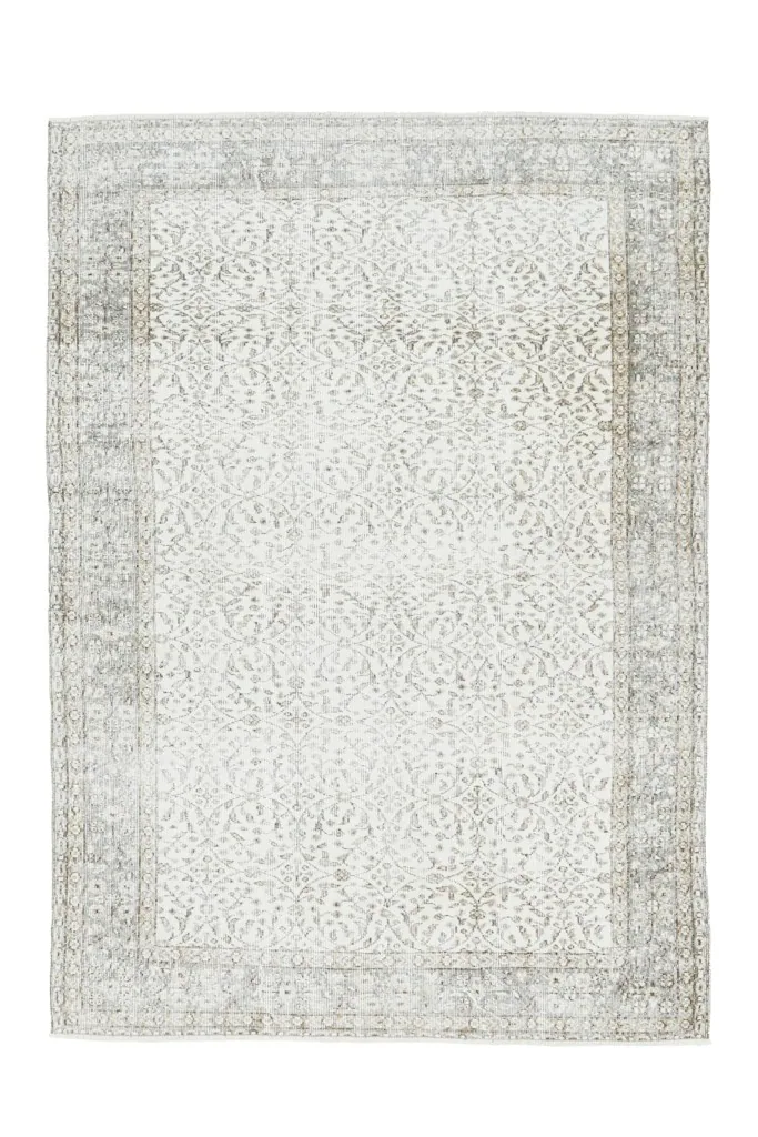 Full overhead view of the ivory and gray vintage Anatolian rug from a higher perspective