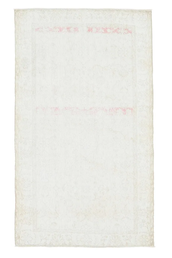 Full overhead view of the 4x7 cream and rose vintage Anatolian rug on a white background, from a slightly different angle.