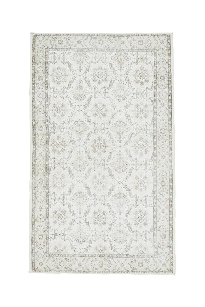 Full overhead view of the ivory and beige vintage Anatolian rug from a slightly different angle