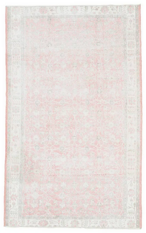 Full top view of the faded pink floral vintage Anatolian area rug