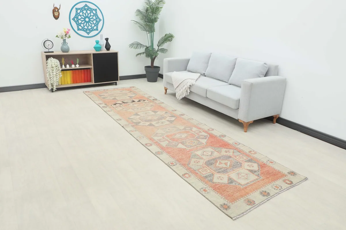 Wide shot of the vintage Anatolian runner in a bright, minimalist interior