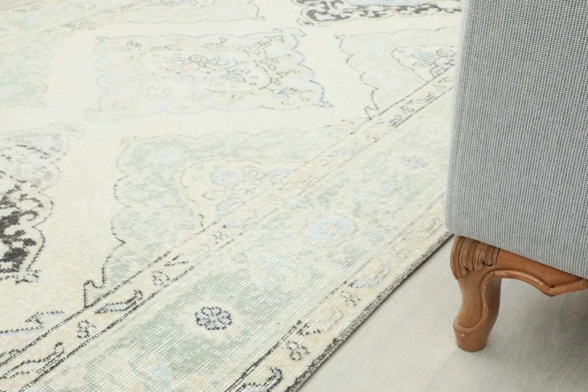 Runner rug placed next to furniture, demonstrating its functional use in a home setting.