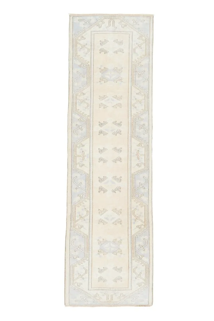 Full overhead view of the vintage Anatolian runner, showcasing its complete design