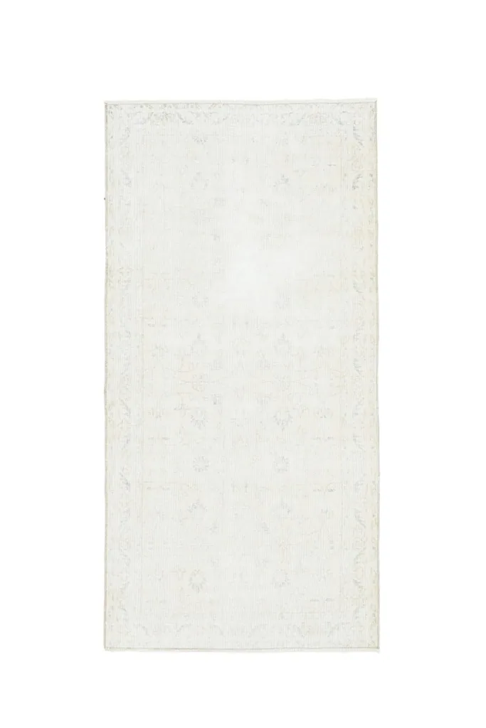 Full top view of the beige floral vintage rug, showcasing its complete design and proportions.