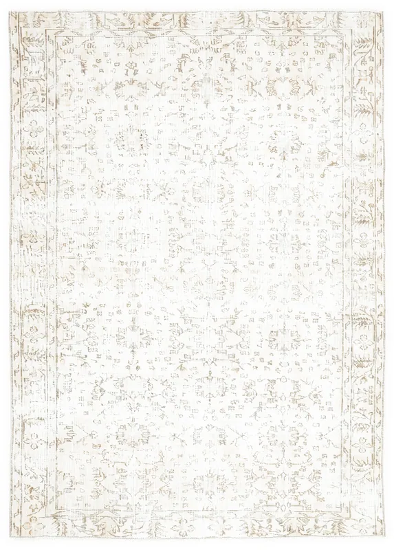 Full overhead view of the vintage ivory and beige Anatolian rug