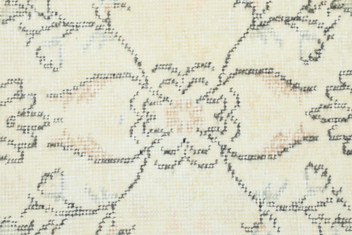 Close-up showing the intricate floral pattern and subtle color variations