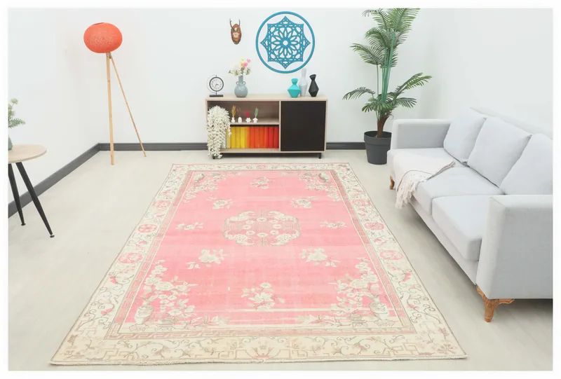 Full overhead view of the pink and ivory vintage Anatolian area rug