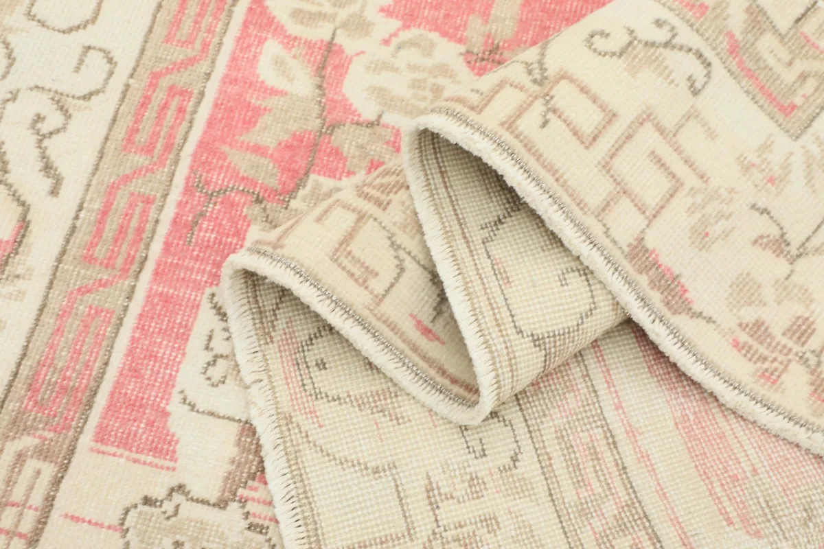 Folded section of the rug, highlighting the texture and construction