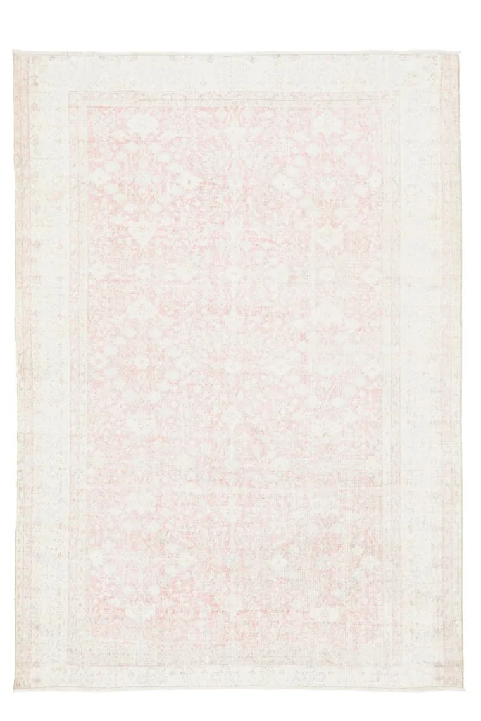 Full overhead view of the 6'6" x 9'3" vintage rose floral rug, highlighting its overall pattern.
