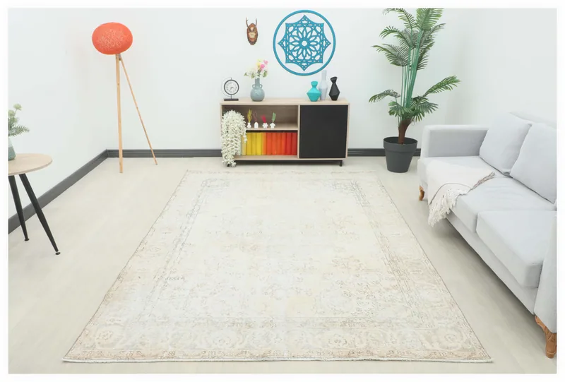 Full top view of the 6'8" x 9'4" beige medallion vintage Anatolian rug on a white background.