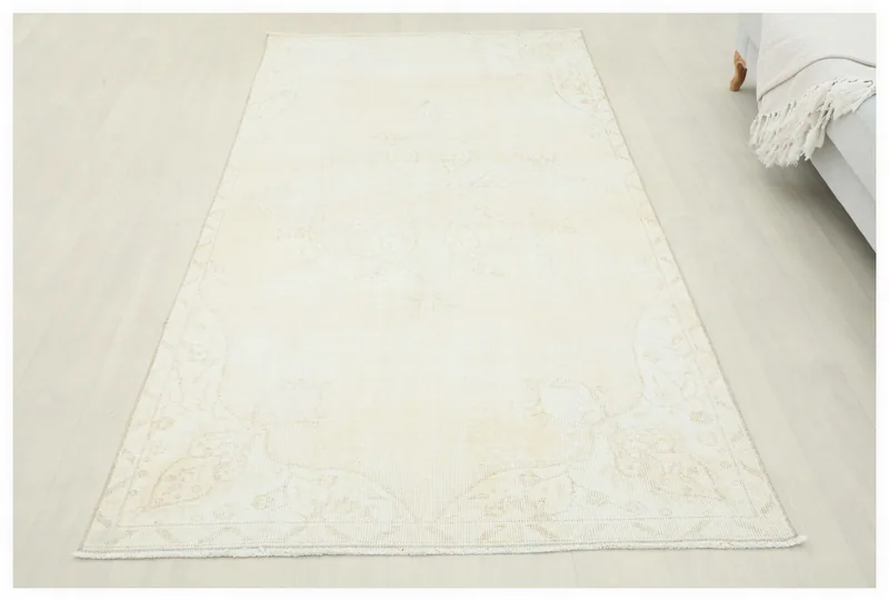 Full top view of the 4x8 cream beige vintage Anatolian area rug
