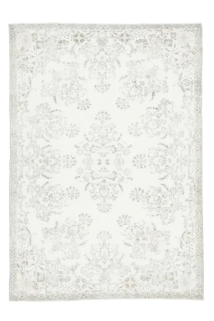 Full overhead view of the 7'2" x 10'0" vintage Anatolian rug, isolated on a white background.