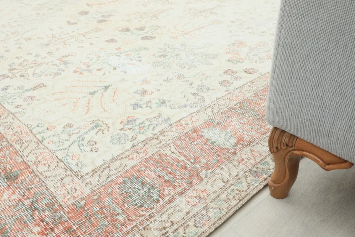 Rug placed under a couch, showcasing its integration into a home decor setting