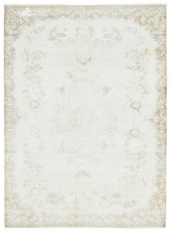 Full overhead view of the cream and beige vintage Anatolian area rug with floral medallion design.