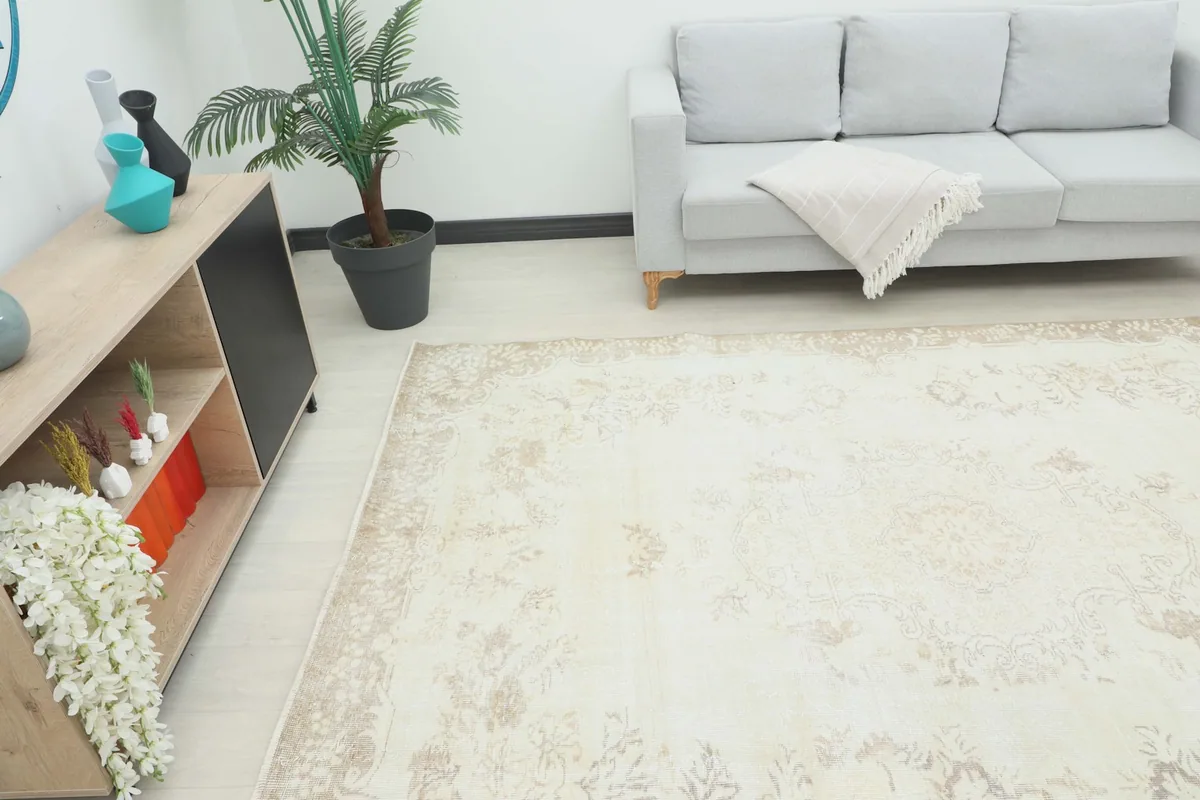 Angle view of the rug in a room, showing its placement relative to furniture.