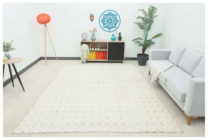 Full overhead view of the 7'5" x 9'10" cream and tan vintage Anatolian rug on a white background.
