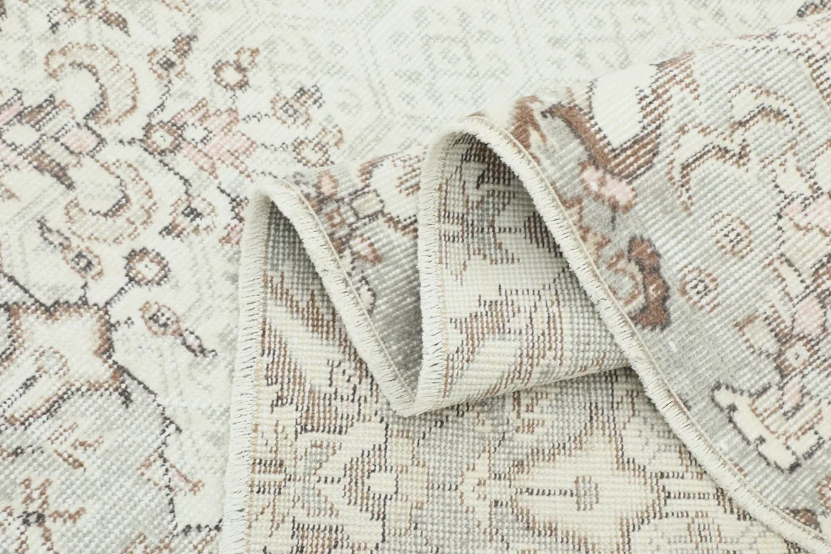 Textural view of the rug's pile and weave shown in a folded section