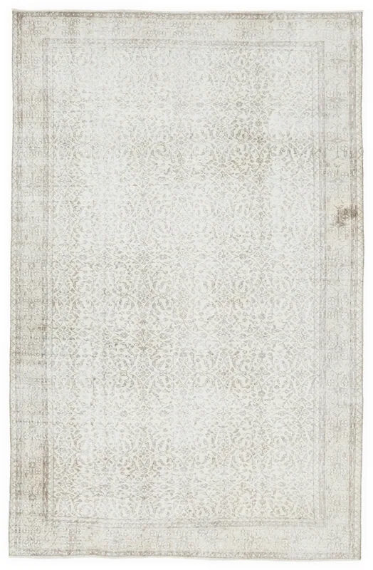 Full overhead view of the 6'8" x 10'0" cream and tan vintage Anatolian rug