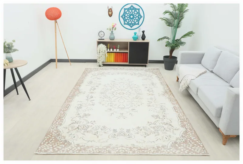 Full top view of the Cream Tan Botanical Medallion Rug on a white background