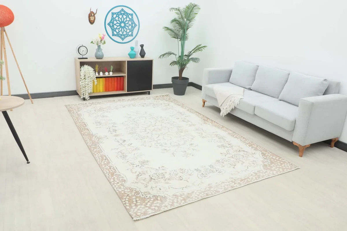 Cream Tan Botanical Medallion Rug displayed in a modern living room setting