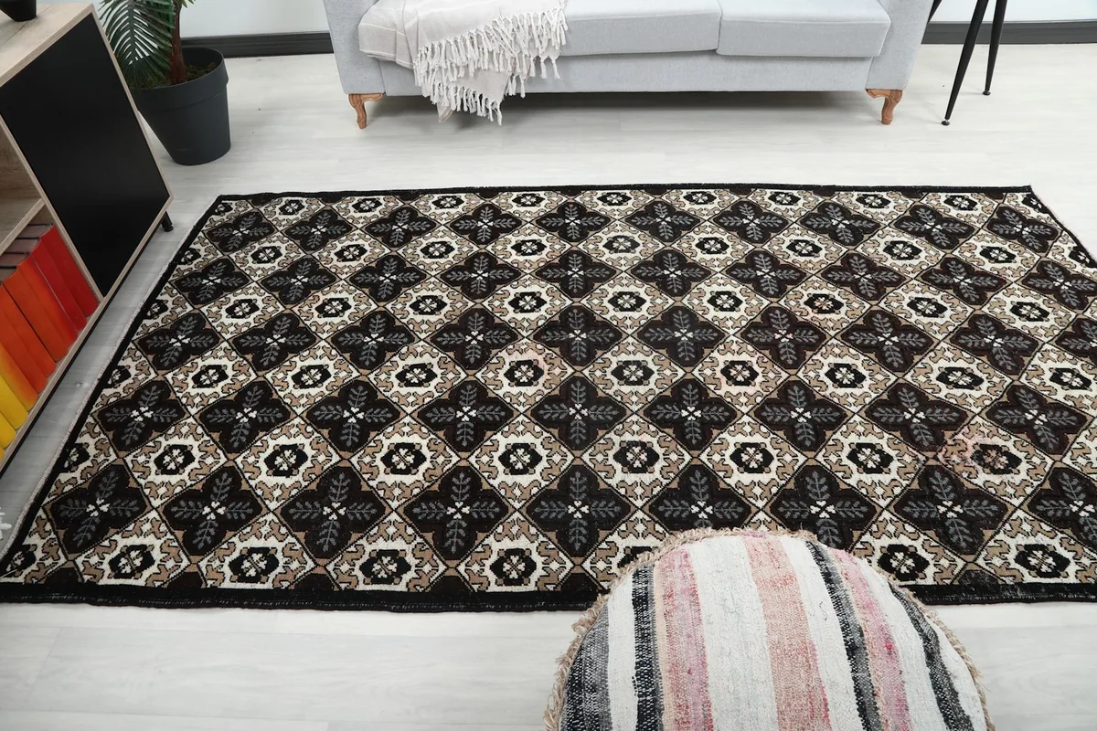 Wide shot of the rug in a living room setup, complementing the decor