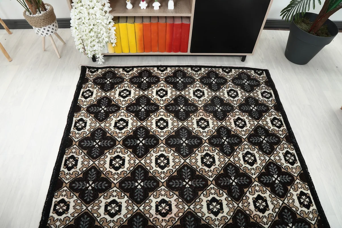 Overhead perspective of the geometric Anatolian rug in a room