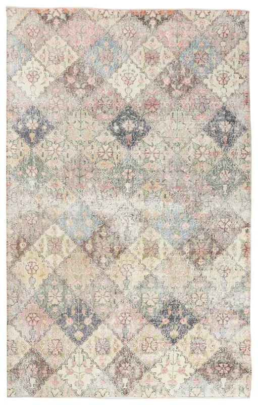 Full overhead view of a multicolor vintage Anatolian area rug with floral geometric patterns