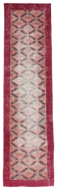 Full overhead view of the 2'9" x 10'8" vintage Anatolian runner with rose and red colors