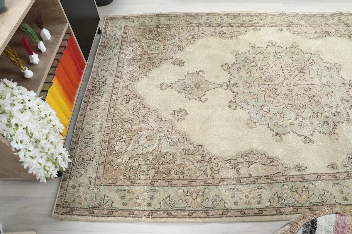 Wide angled view of the rug from above, capturing its full length and the softened color palette