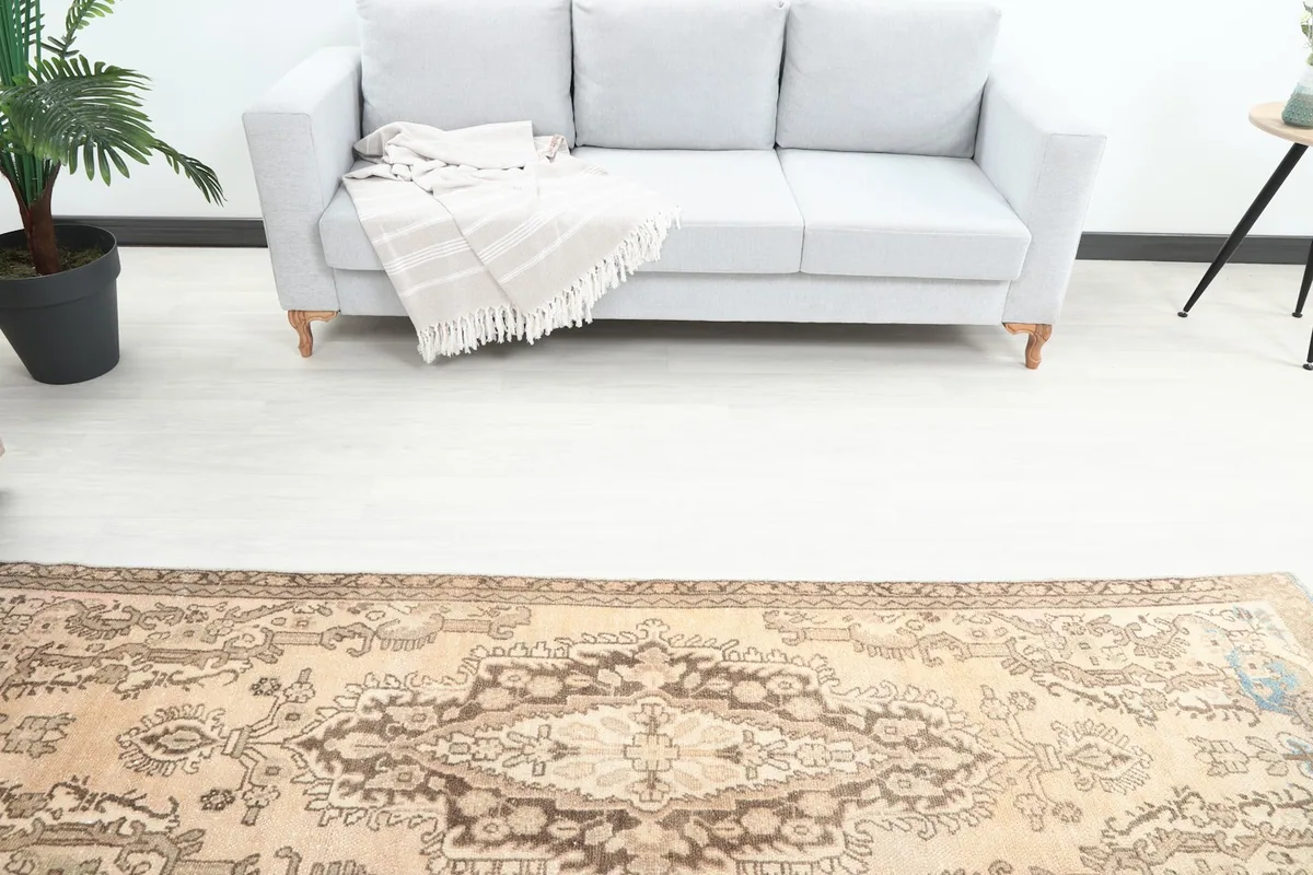 Overhead view of the runner rug in the room, showing the central medallion and surrounding motifs.