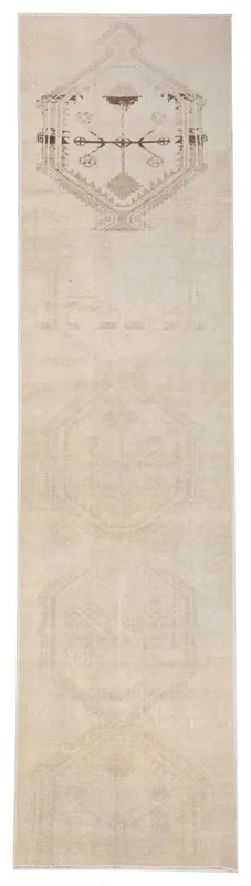 Full top view of the 2'10" x 11'3" beige vintage Anatolian runner rug with tribal geometric patterns.