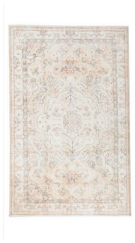 Full top view of the 5'8" x 8'10" vintage Anatolian rug with ivory, orange, and gray floral patterns