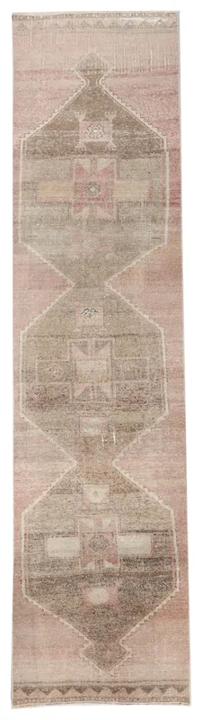 Full top view of the 2'8" x 11'0" vintage Anatolian runner with rose and brown geometric patterns