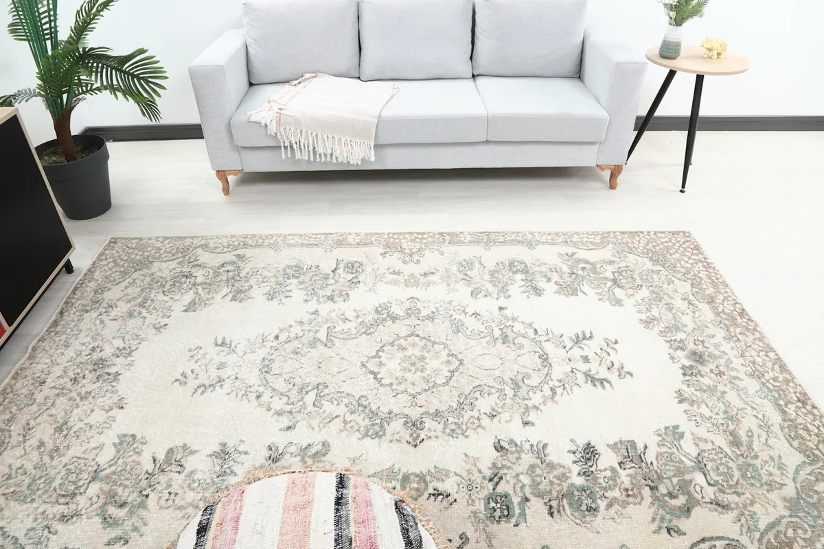 Overhead view of the rug showcasing its central medallion and surrounding floral motifs