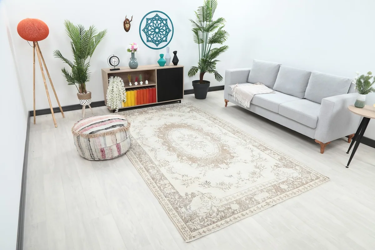 Area rug in a living space, showing its orientation relative to a sofa and side table