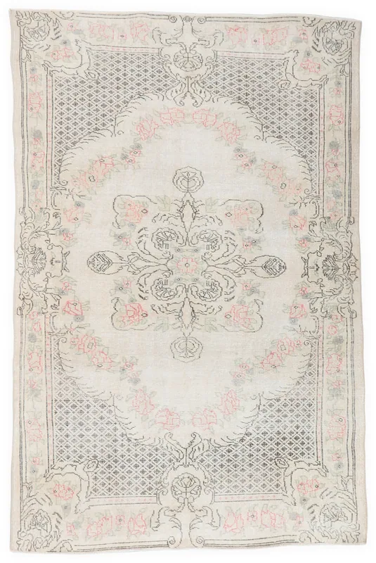Full overhead view of the vintage Anatolian rug with a cream field and rose and gray patterns