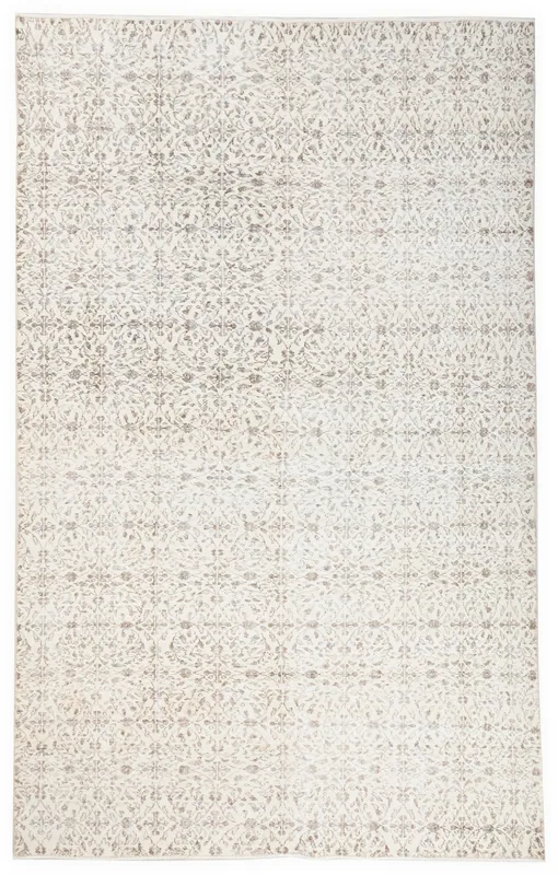 Full overhead view of the 6'10" x 10'2" ivory and brown floral vintage Anatolian area rug