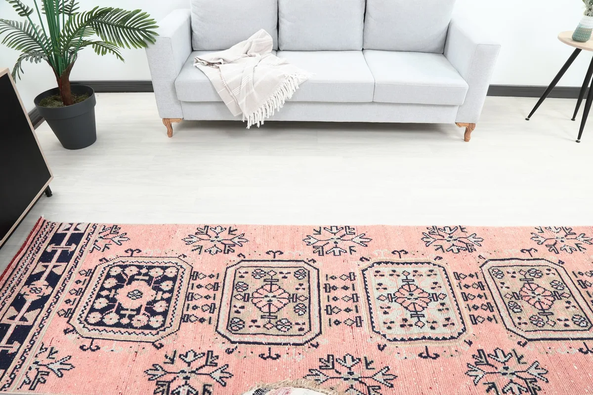 Overhead shot of the runner rug extending into a living space, showing the full pattern repeat