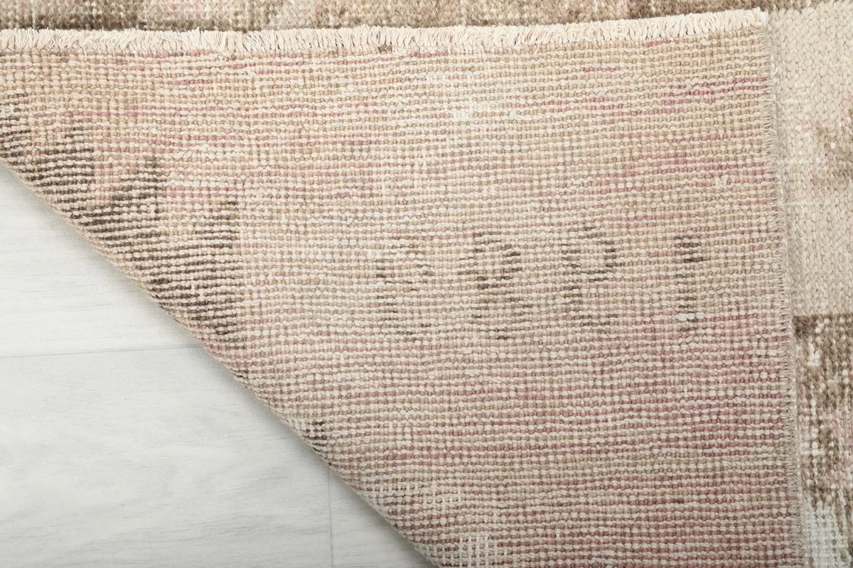View of the hand-knotted cotton foundation on the back of the vintage Anatolian runner