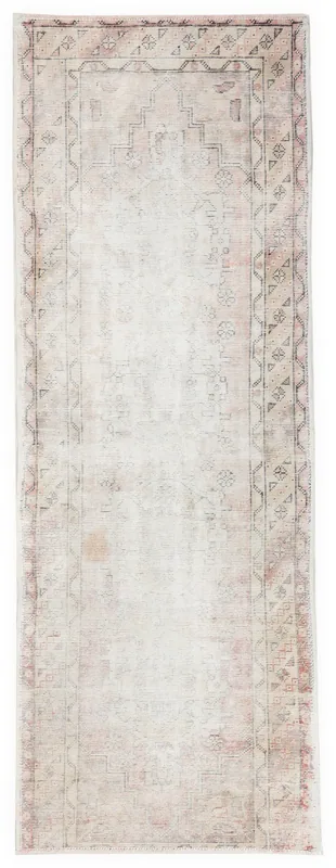 Full top view of the 3x9 vintage Anatolian runner rug with rose and ivory geometric patterns