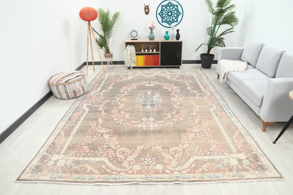 Gray Rose Medallion Anatolian Rug in a living room setting, showcasing its large size and pattern.