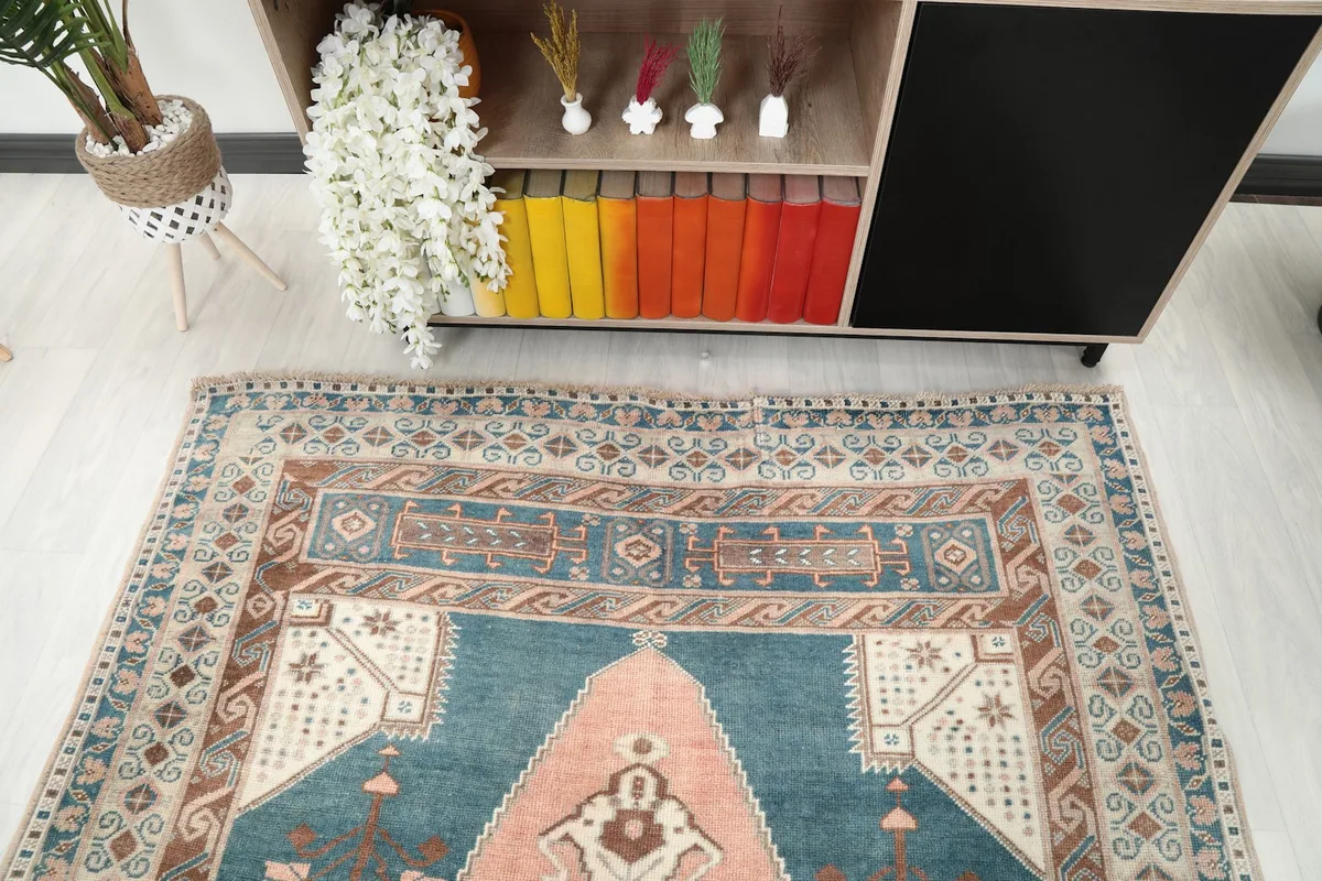 Overhead view of the top section of the rug, showing details of the border and field design
